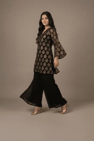 Black and gold printed kurta set with flared sleeves and wide-leg palazzo pants