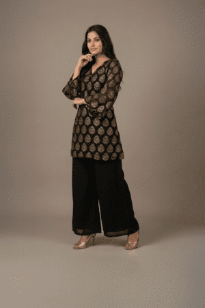 Black and gold printed kurta set with flared sleeves and wide-leg palazzo pants