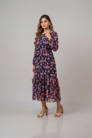 Navy blue floral ruffle midi dress with pink flower print, long sleeves and a tie-up waist