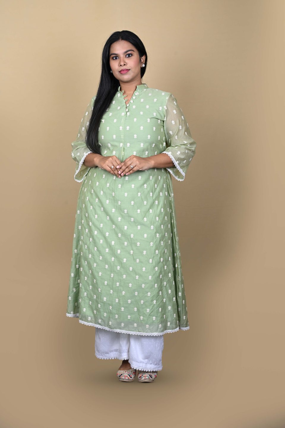Mint green embroidered kurta set with white palazzos