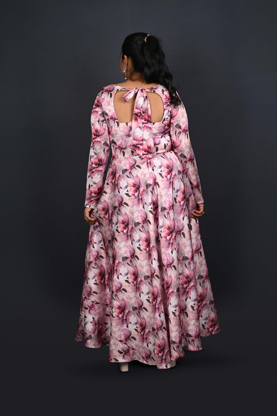 Full-length evening gown in floral satin with long sleeves