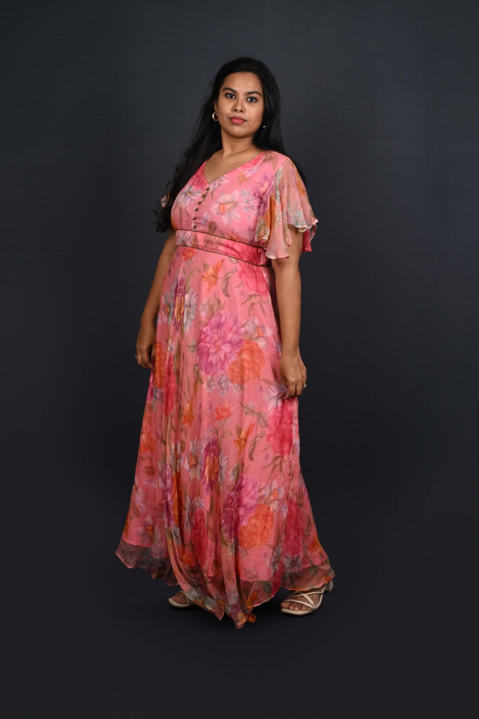 Coral garden maxi dress with flutter sleeves – Ivory by Radhika