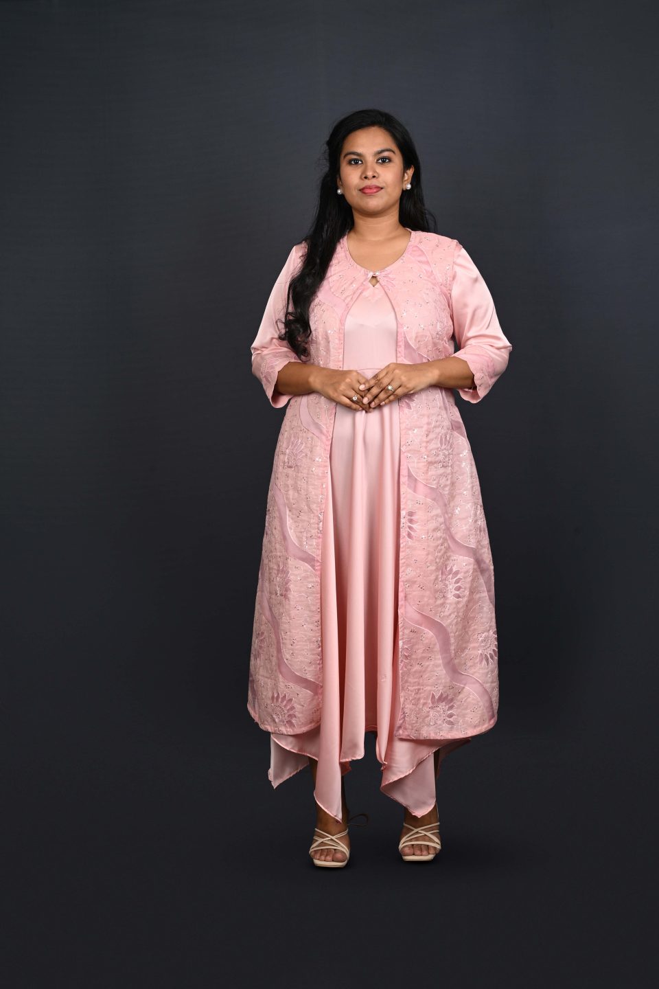 Blush pink satin gown with embroidered organza overlay