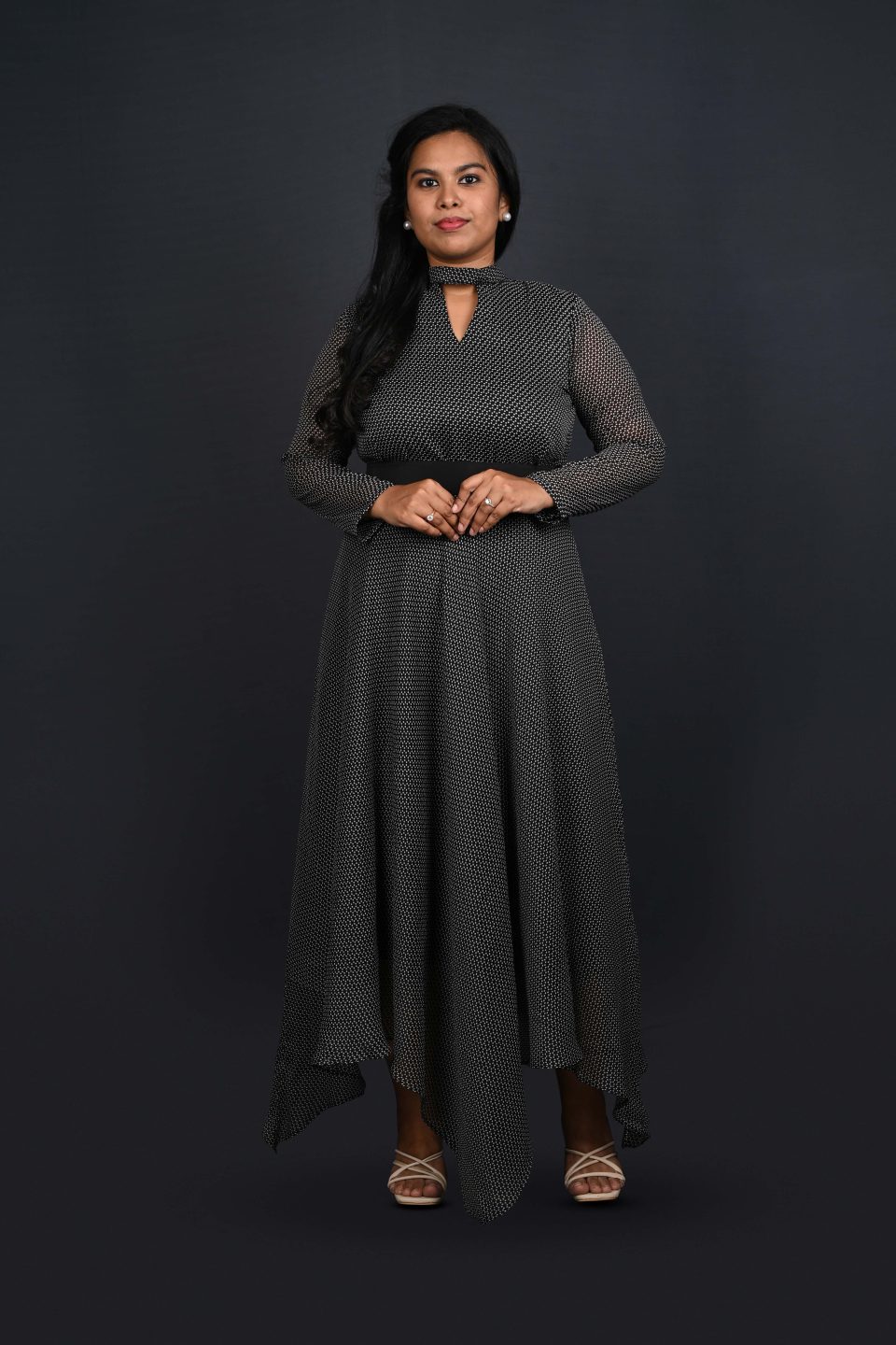 Black asymmetric gown with choker neck – Ivory by Radhika