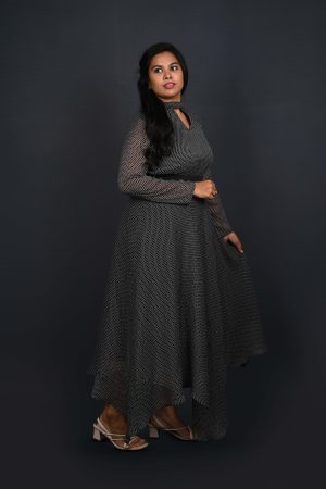 Floor-length black gown with white polka dots