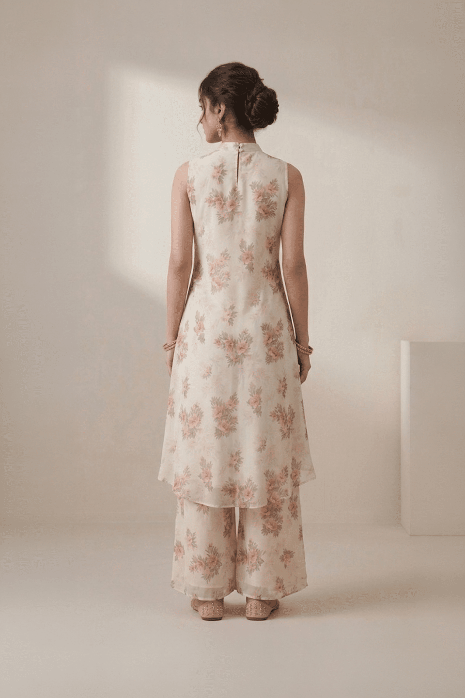 Ivory floral kurti set for women with sleeveless kurti and wide leg pants