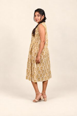 Yellow and beige Ajrakh cotton sleeveless dress, full-length side view with nude ankle-strap sandals