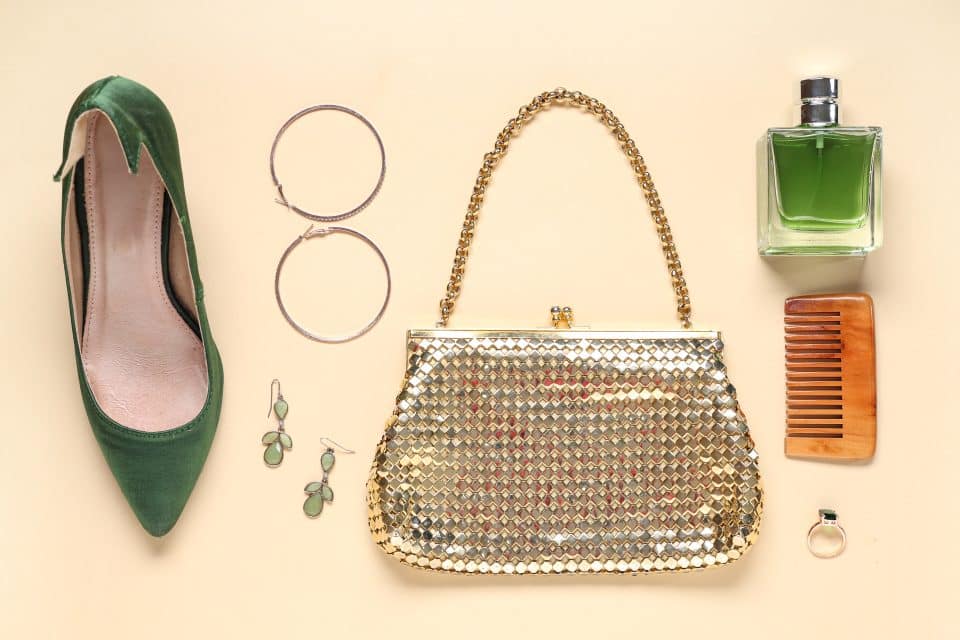flat lay of outfit with jewelry