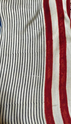 white and red striped co-ord set front view on model – Ivory by Radhika