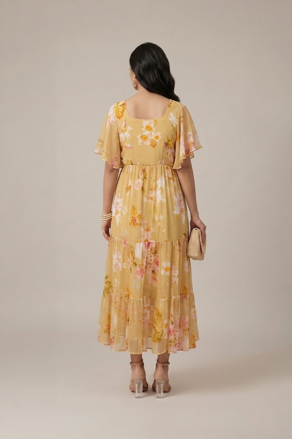 Pastel yellow floral tiered maxi dress with flutter sleeves