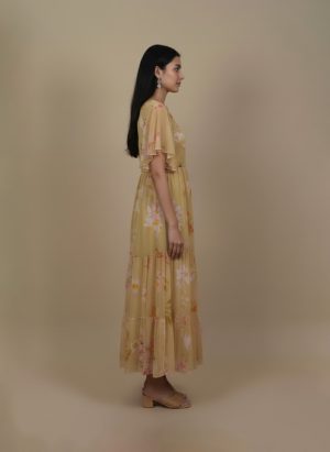 Pastel yellow floral tiered maxi dress with flutter sleeves
