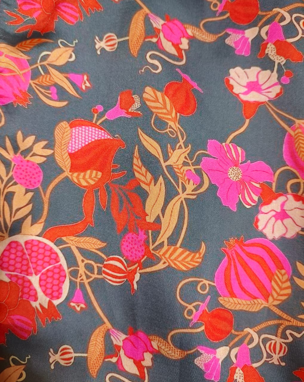 Model wearing Plum Floral Kurta Set from ivory by radhika, a cotton outfit featuring elegant plum and crimson floral prints with matching pants.