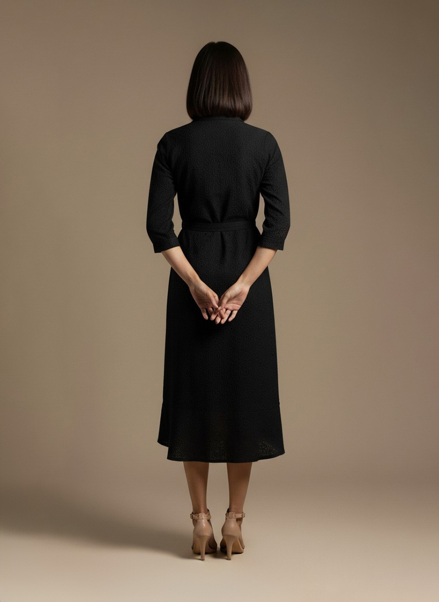 Black eyelet shirt dress for women – front view showing collared neckline, button-down design, and waist tie, by Ivory by Radhika.