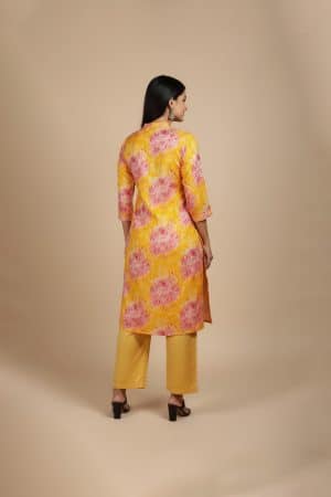 yellow floral kurta for women with pink rose prints and mandarin collar