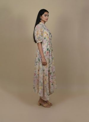 Back view of floral high low dress with flowy high low hem.