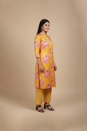 yellow floral kurta for women with pink rose prints and mandarin collar