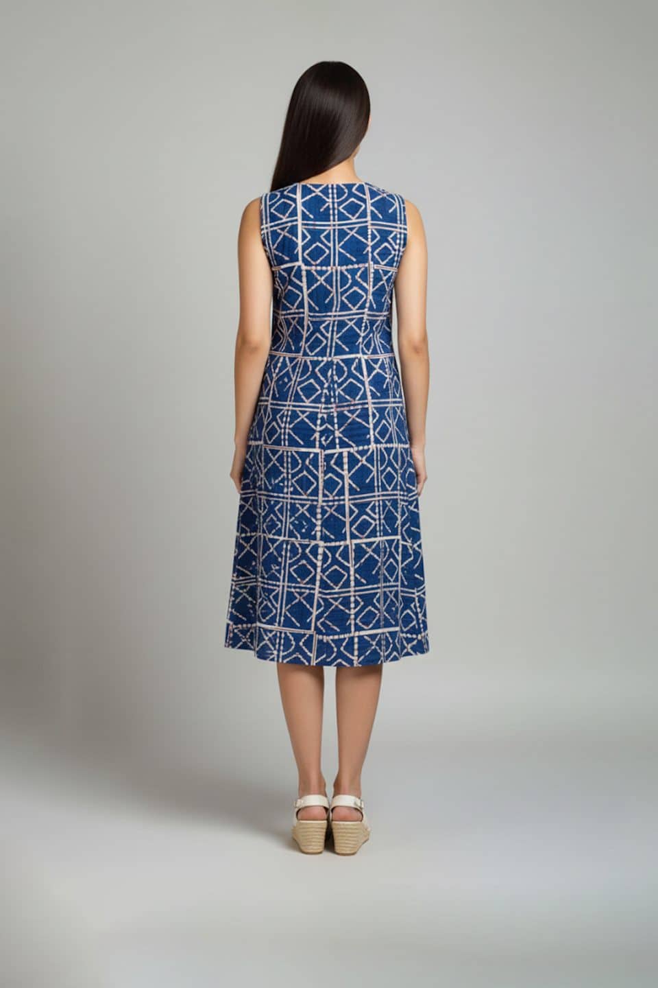 Blue cotton sleeveless dress with geometric print