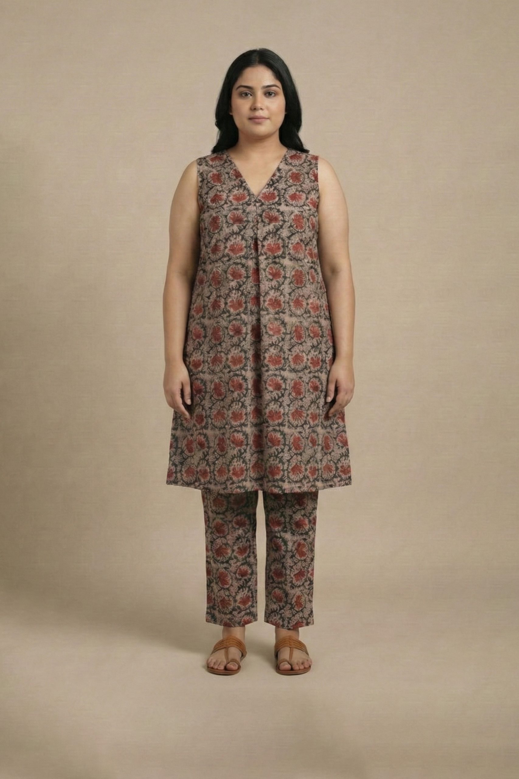 "Paisley Print Kurta Set front view – sleeveless V-neck kurta with matching printed pants"