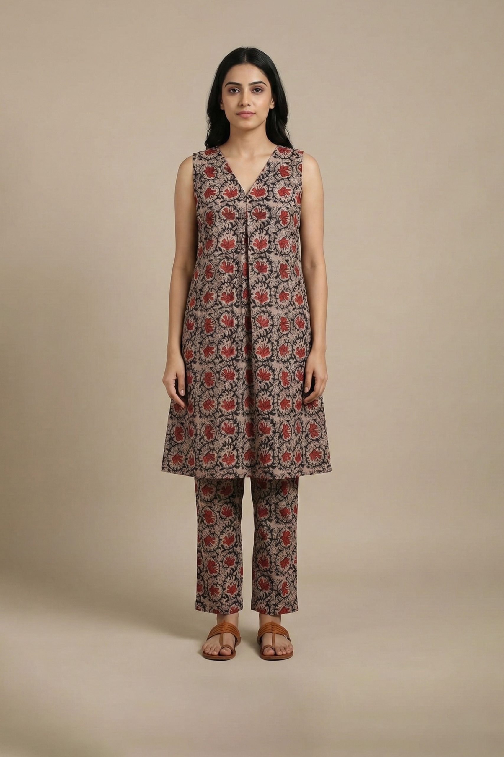 "Paisley Print Kurta Set front view – sleeveless V-neck kurta with matching printed pants"