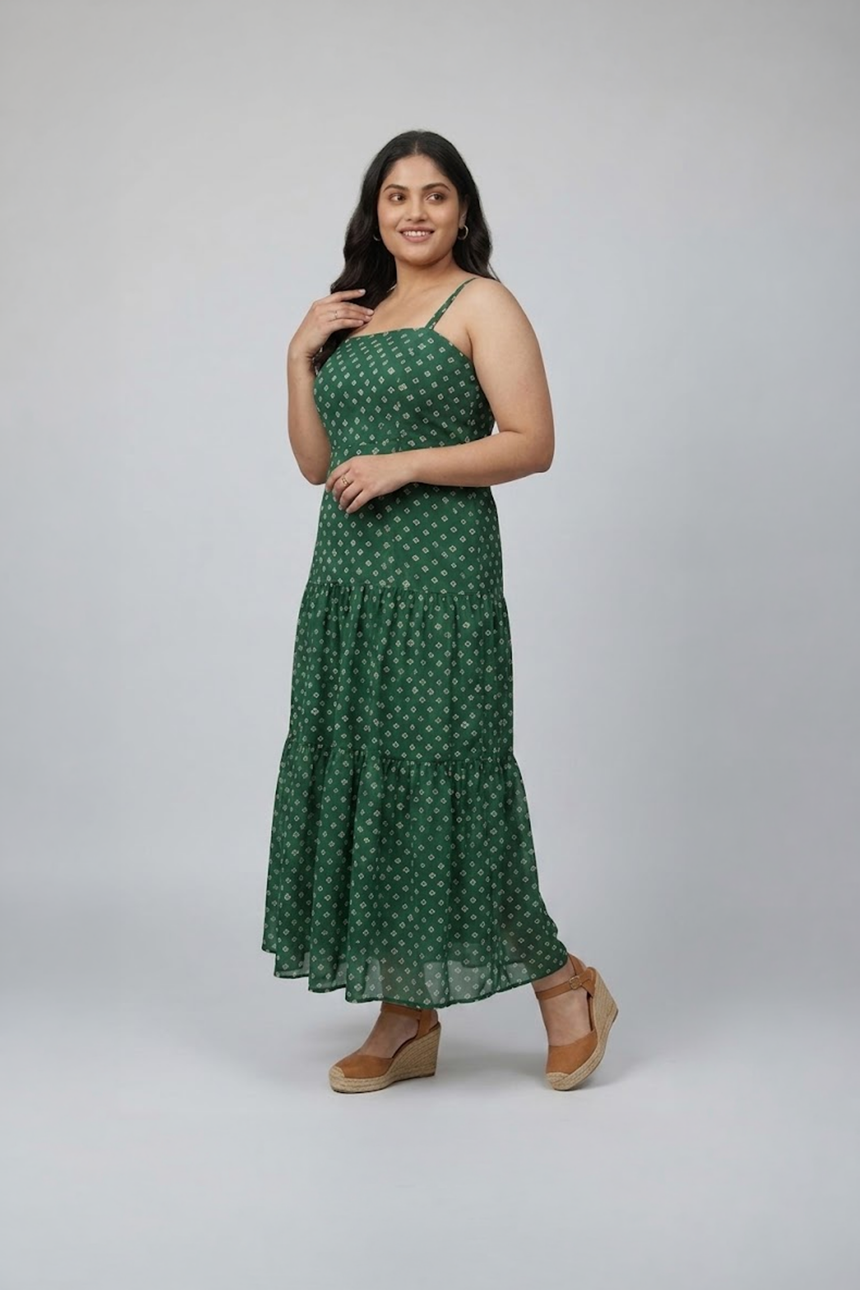 Green bandhani printed sleeveless tiered dress