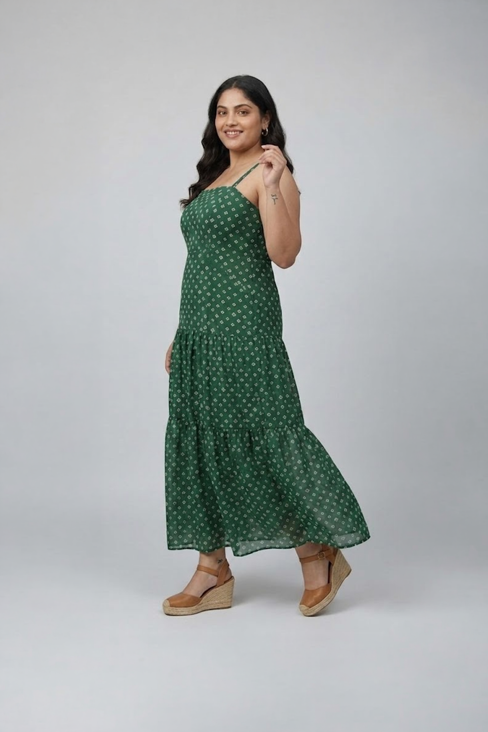Green bandhani printed sleeveless tiered dress