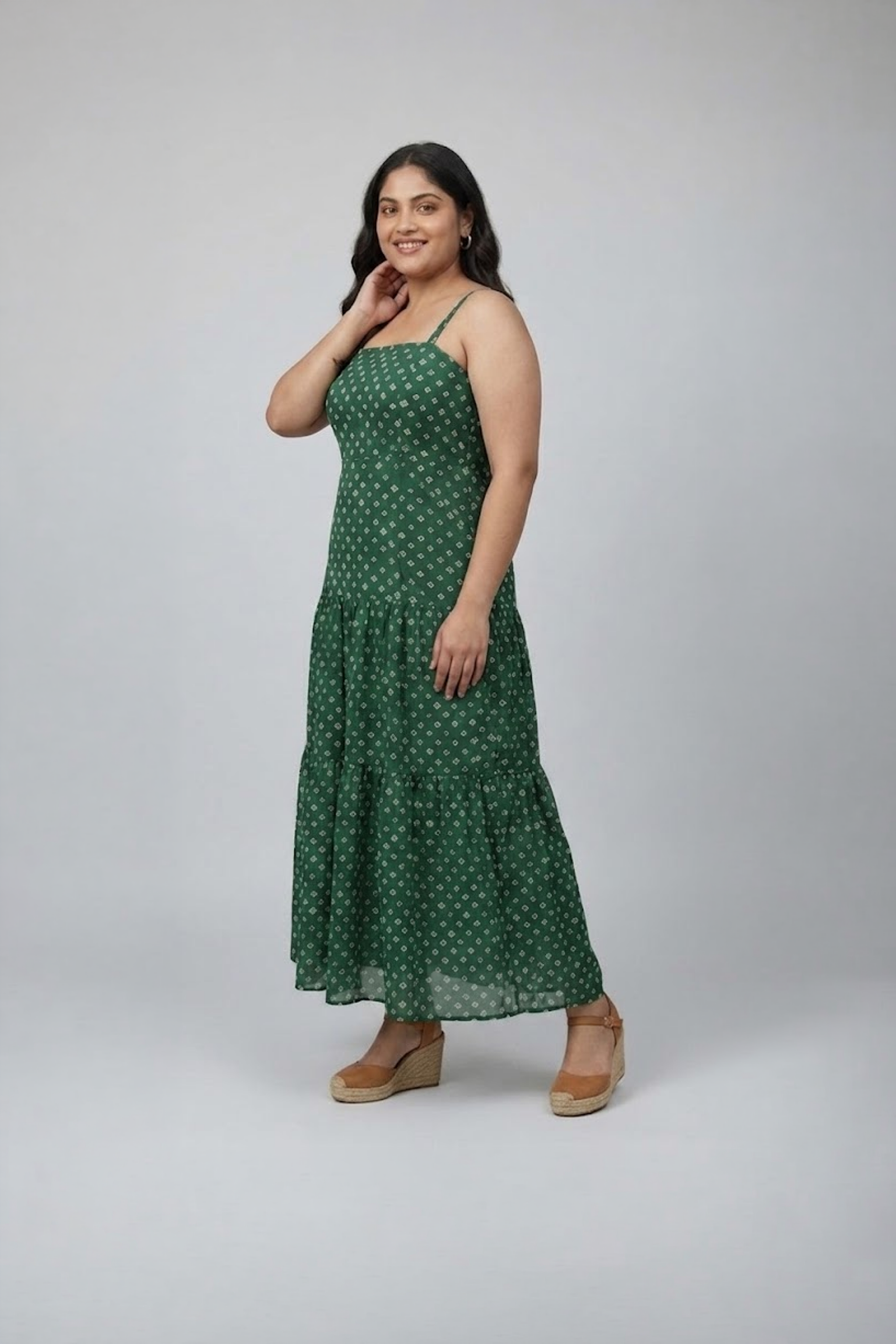 Green bandhani printed sleeveless tiered dress