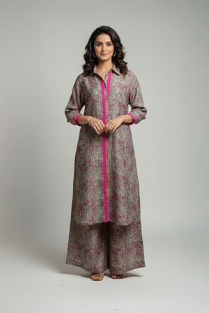 Woman wearing grey pink printed kurta set with long kurta and wide-leg pants