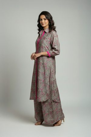 Woman wearing grey pink printed kurta set with long kurta and wide-leg pants
