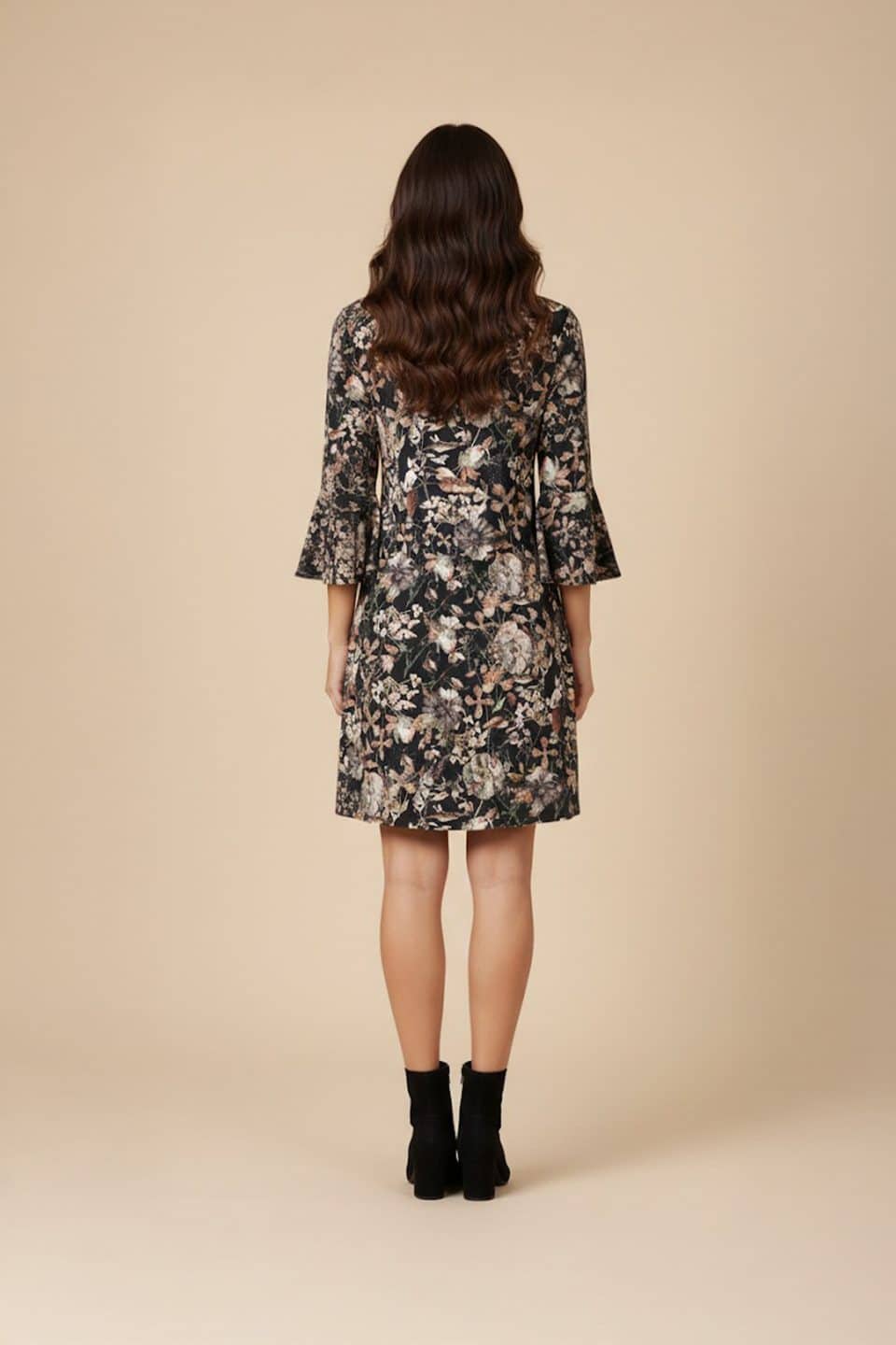 Black floral shift dress with round neckline and three-quarter bell sleeves