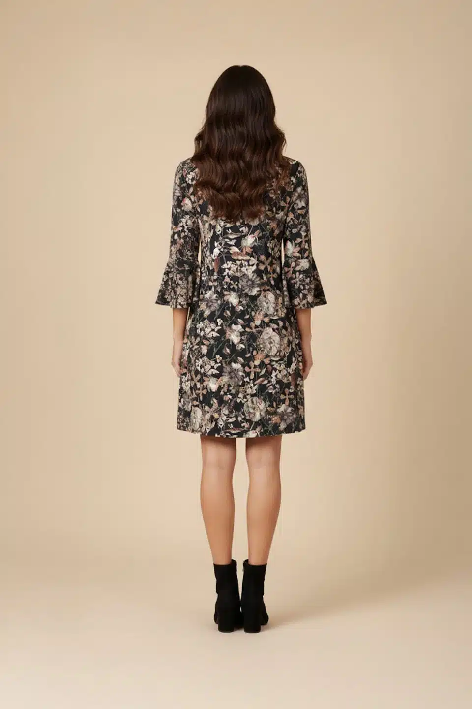 Black botanical shift dress with bell sleeves, back view