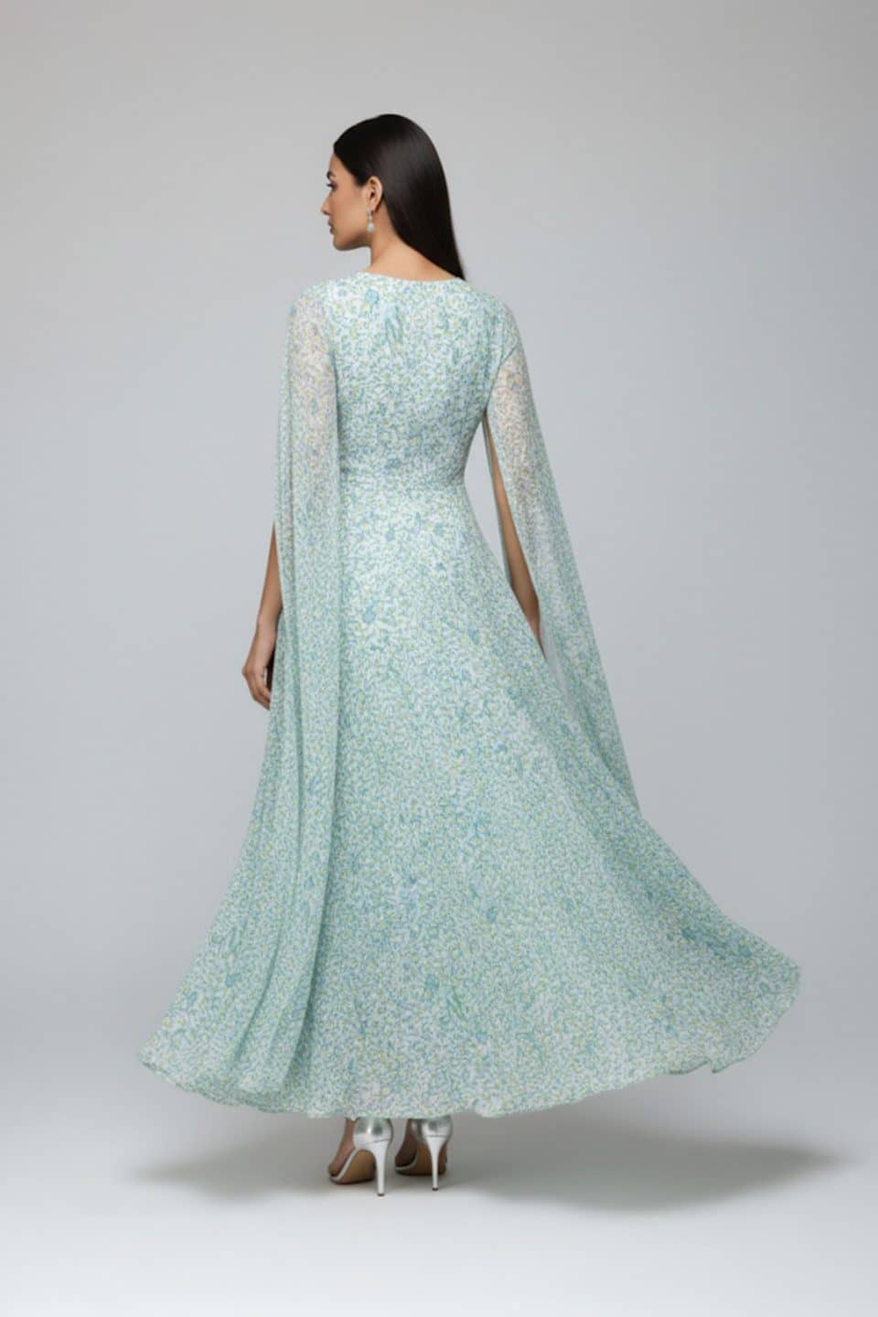 Pastel green floral cape sleeve maxi dress with round neckline and flowy A-line silhouette