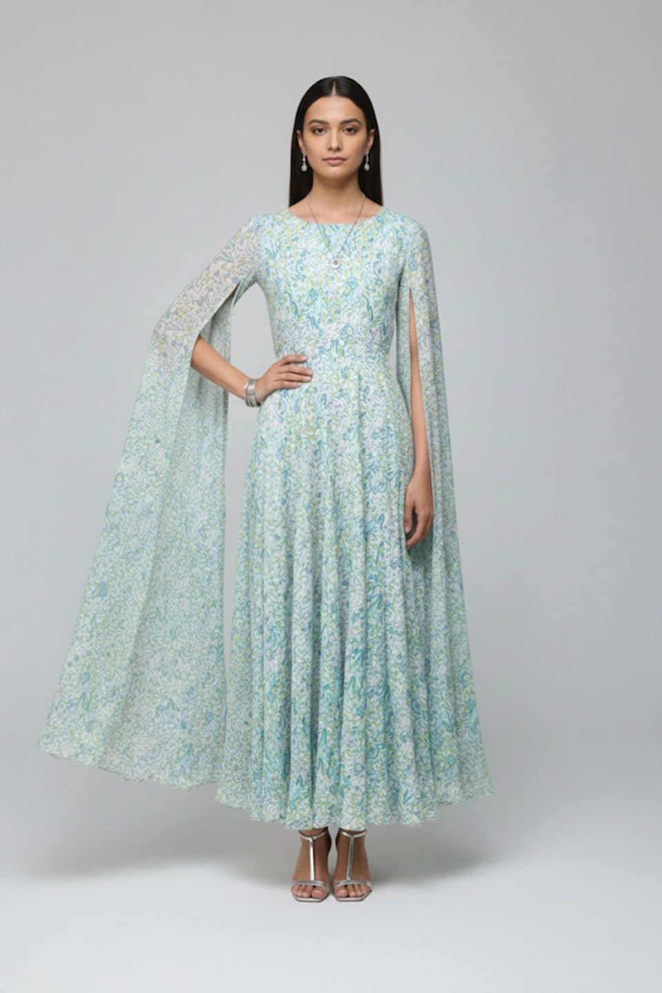 Pastel green floral cape sleeve maxi dress with round neckline and flowy A-line silhouette