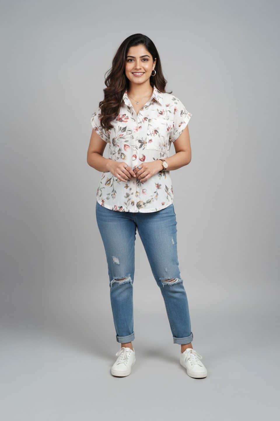 Cream floral shirt top for women with short sleeves and relaxed fit paired with blue jeans