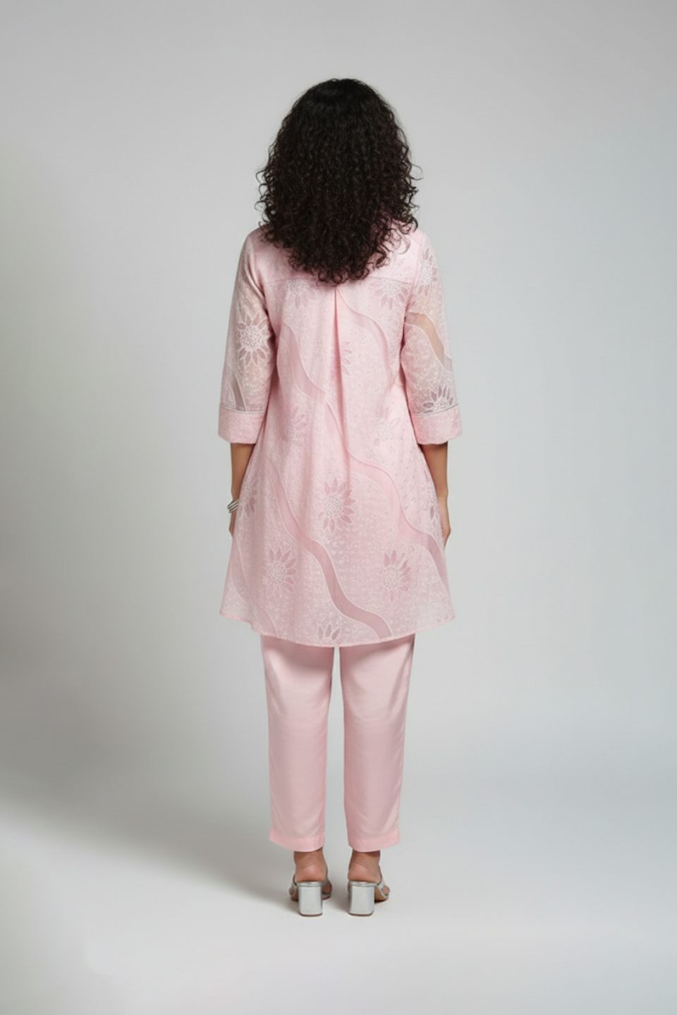 Blush pink organza shirt-style tunic with subtle floral texture paired with matching straight pants – elegant Indo-Western co-ord set by Ivory by Radhika.