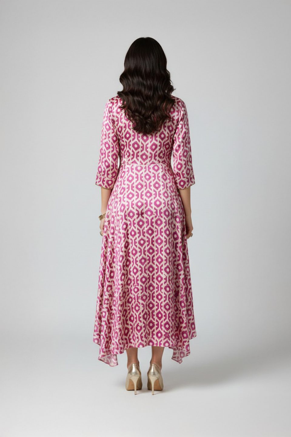 Plus size pink ikat printed high-low dress with three-quarter sleeves and front zip detail