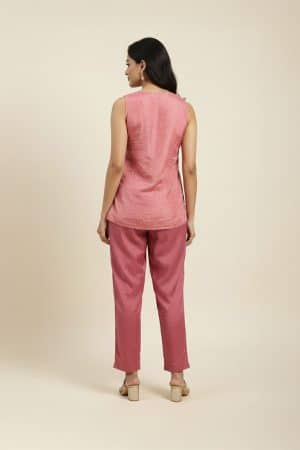 Pink embroidered co-ord set for women with sleeveless tie-neck kurta top and straight pants