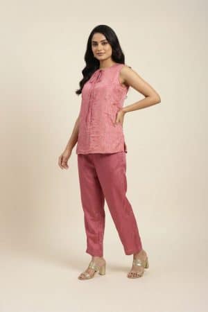 Pink embroidered co-ord set for women with sleeveless tie-neck kurta top and straight pants