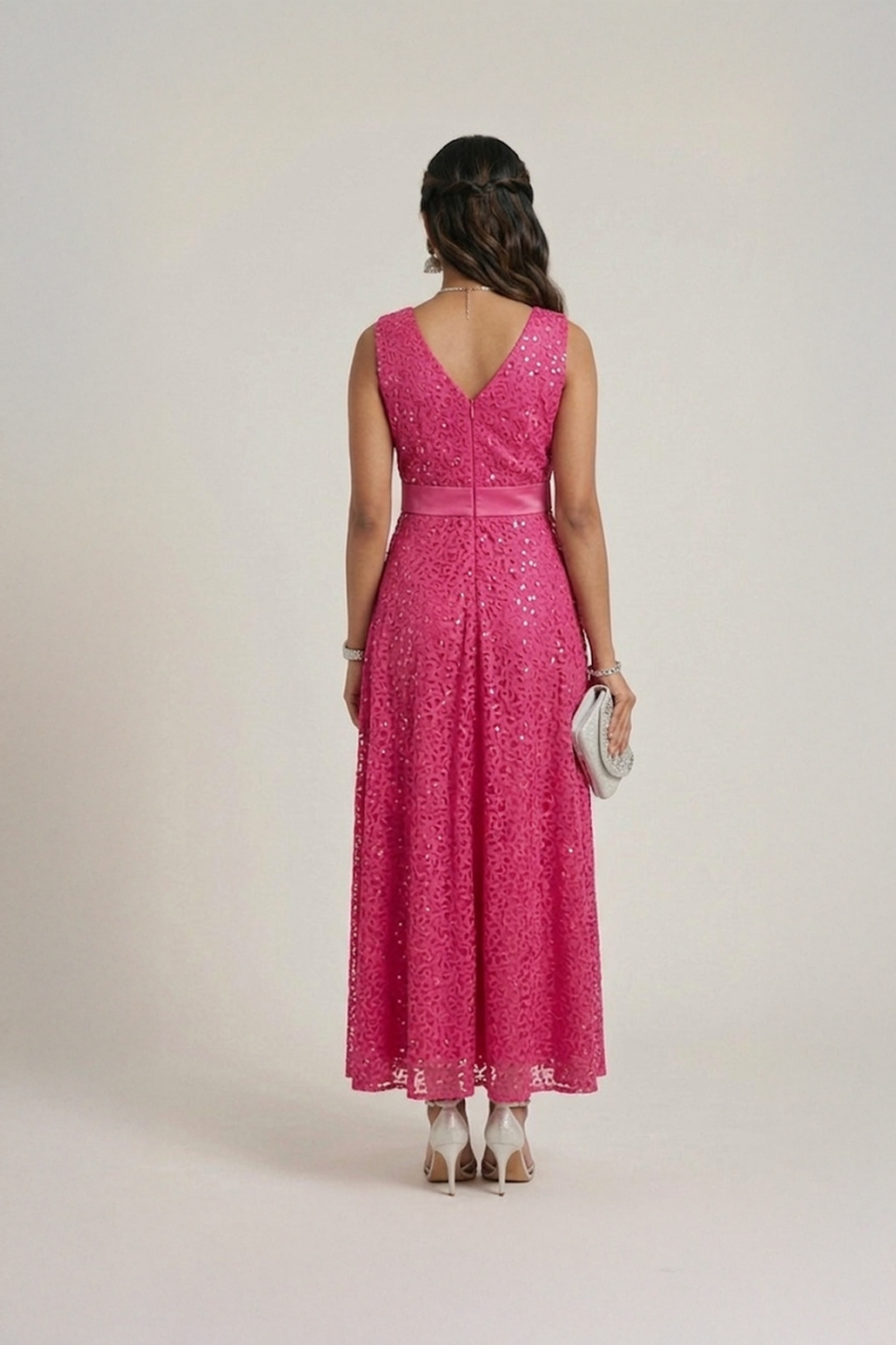 Pink lace dress with sleeveless design and midi length