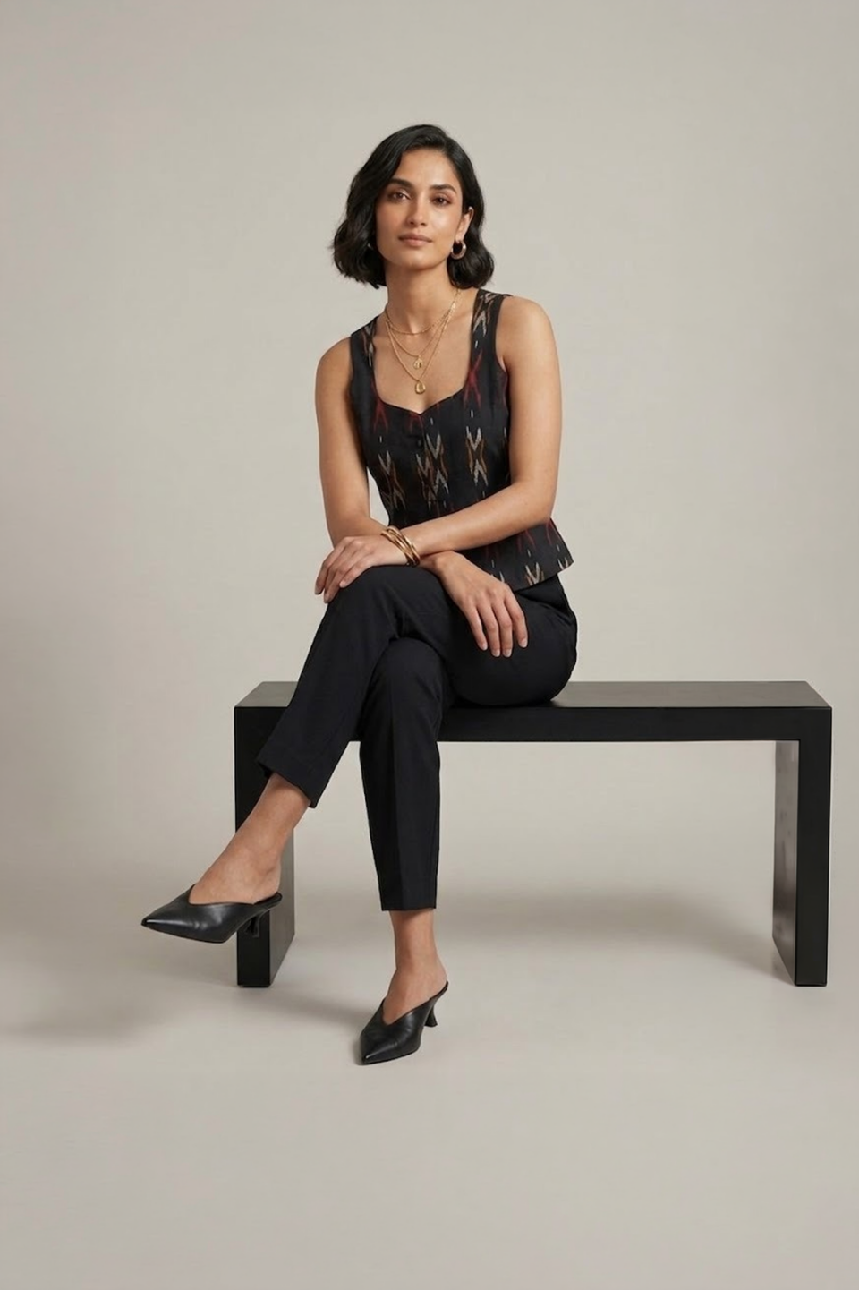 black ikat top for women with sleeveless design and tailored fit