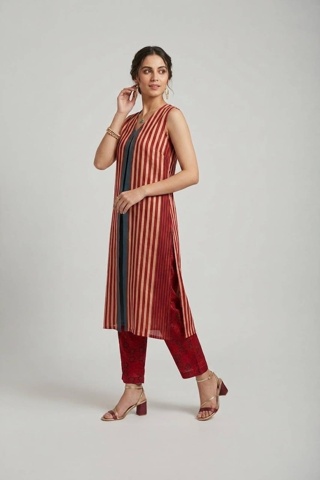 Striped kurti set for women with sleeveless kurta and straight pants