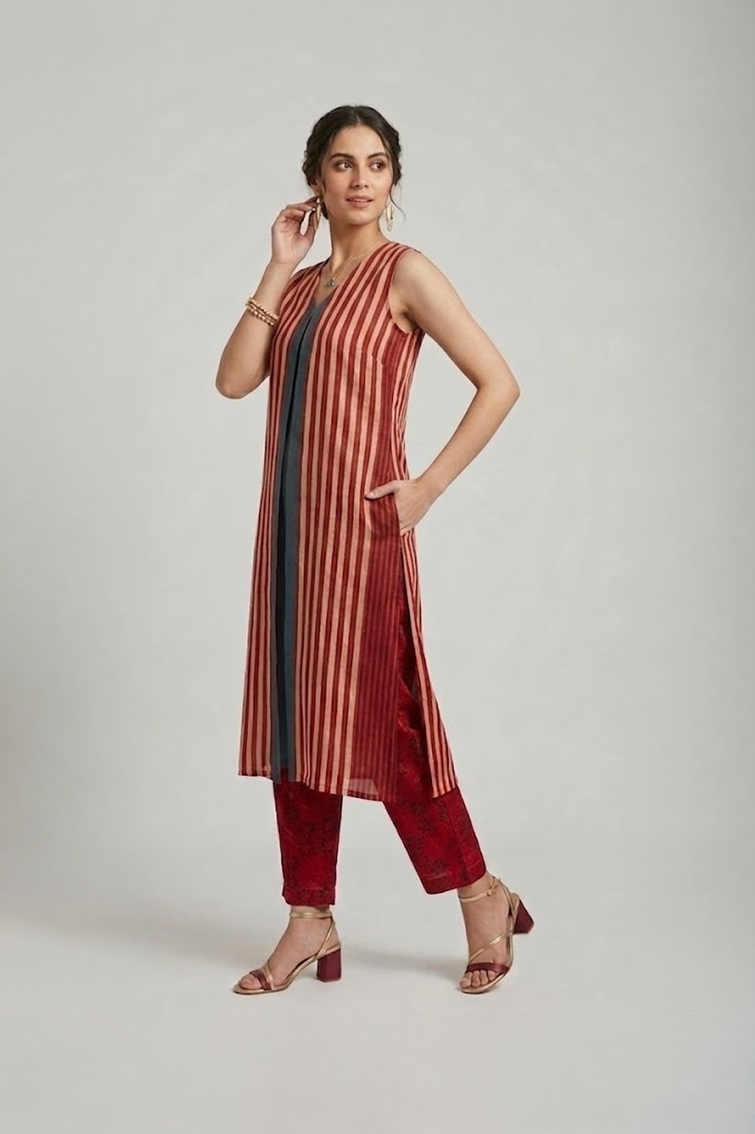 Striped kurti set for women with sleeveless kurta and straight pants