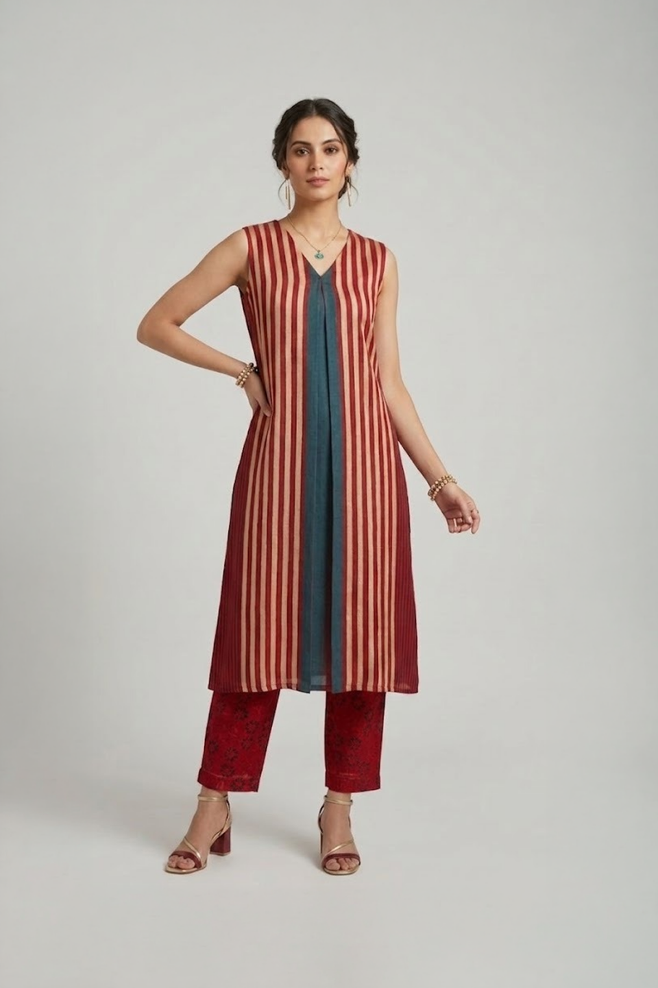Striped kurti set for women with sleeveless kurta and straight pants