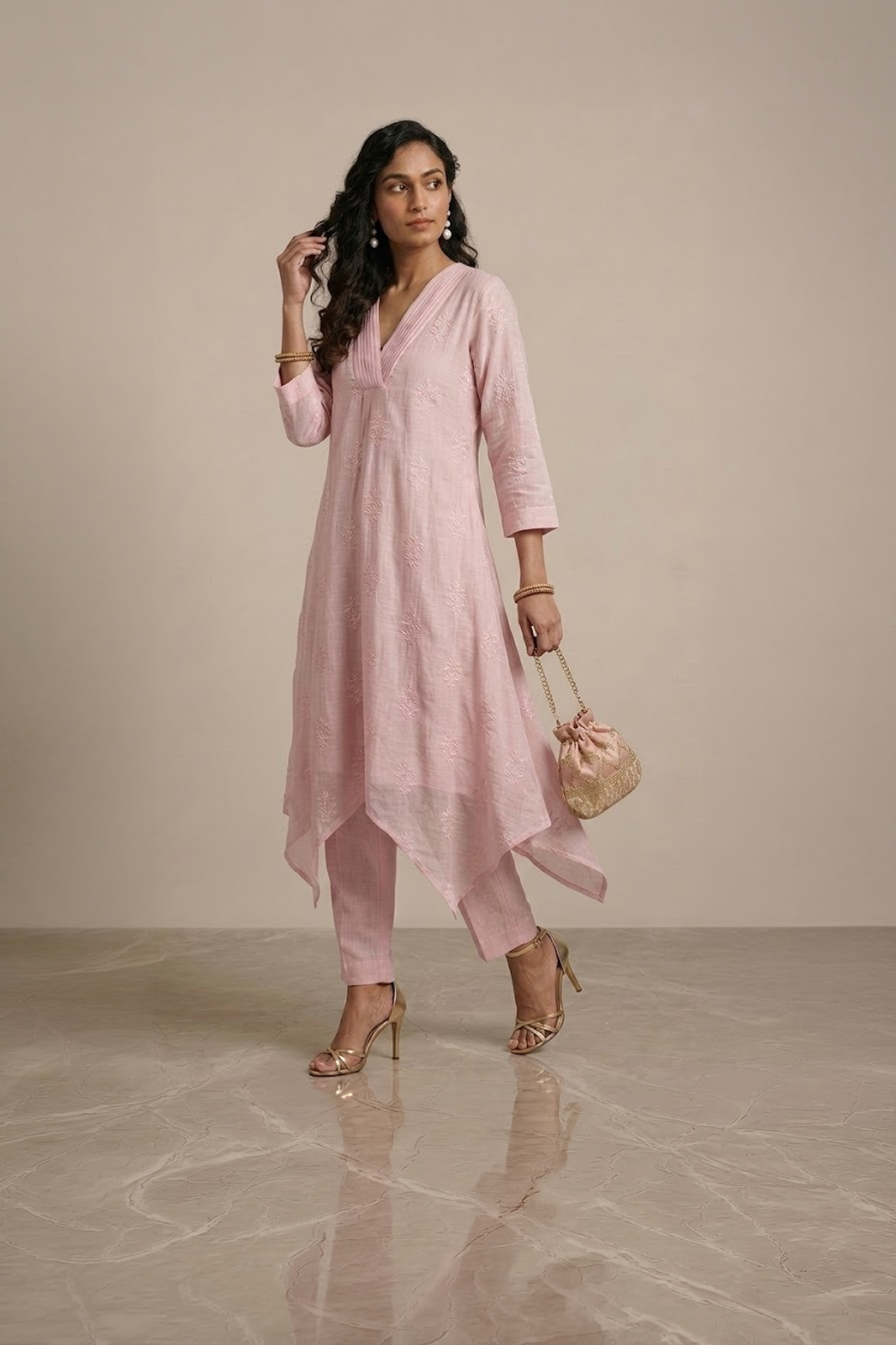 pink kurta set for women with asymmetrical hem and pants