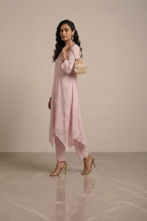 pink kurta set for women with asymmetrical hem and pants