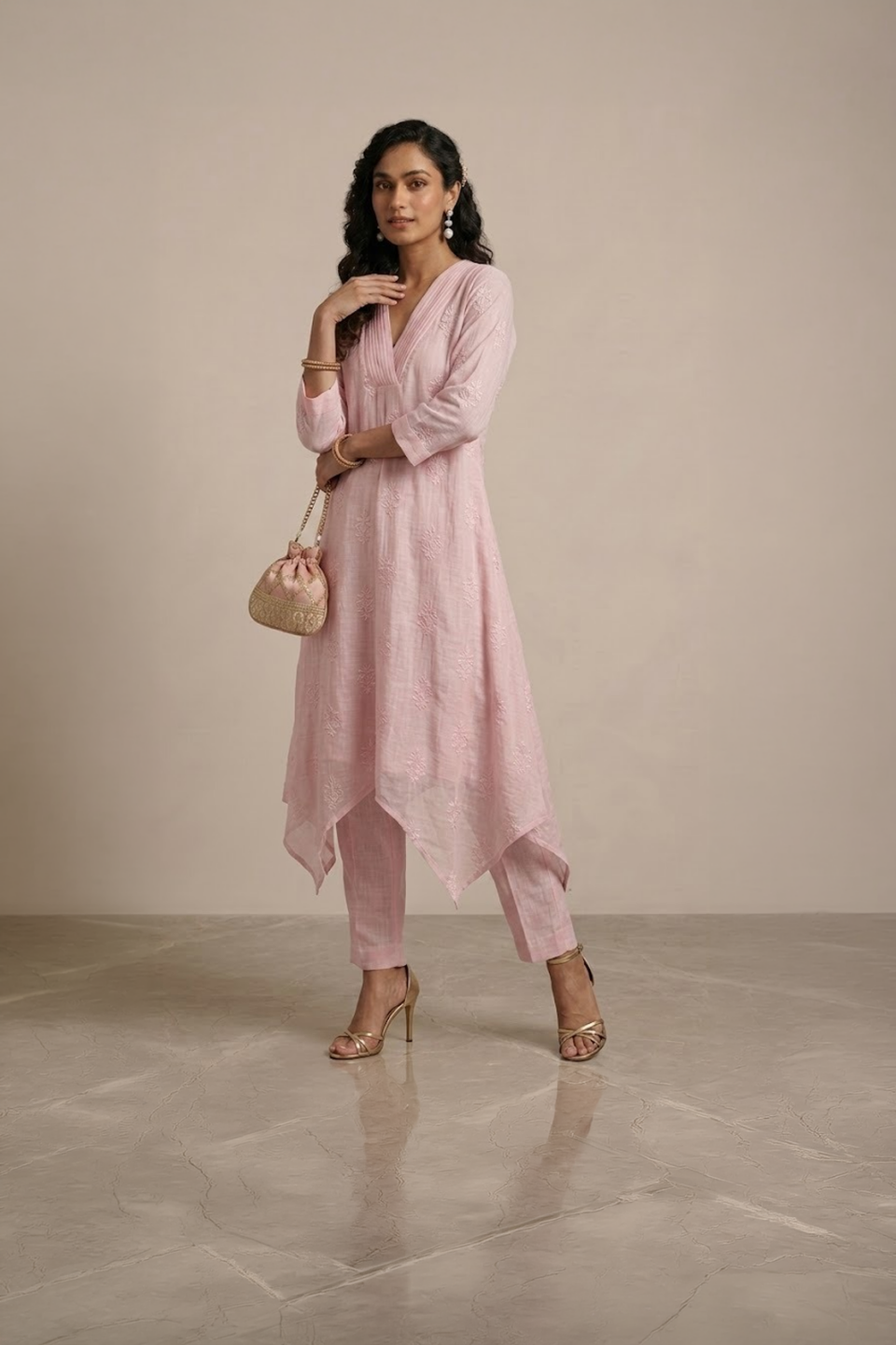 pink kurta set for women with asymmetrical hem and pants