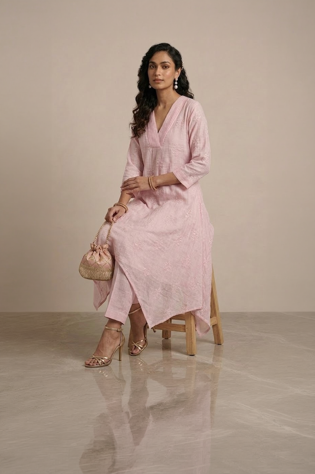 pink kurta set for women with asymmetrical hem and pants