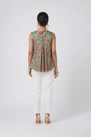 Sage green floral top with coral print and front pleats