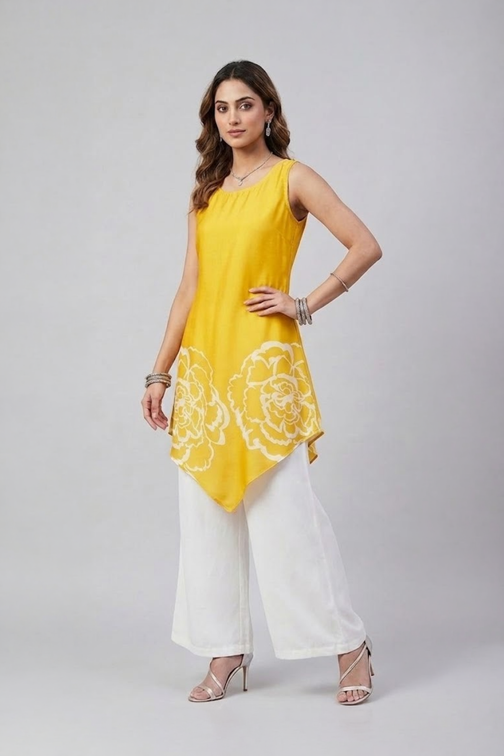 Yellow floral asymmetric tunic set with white wide-leg pants