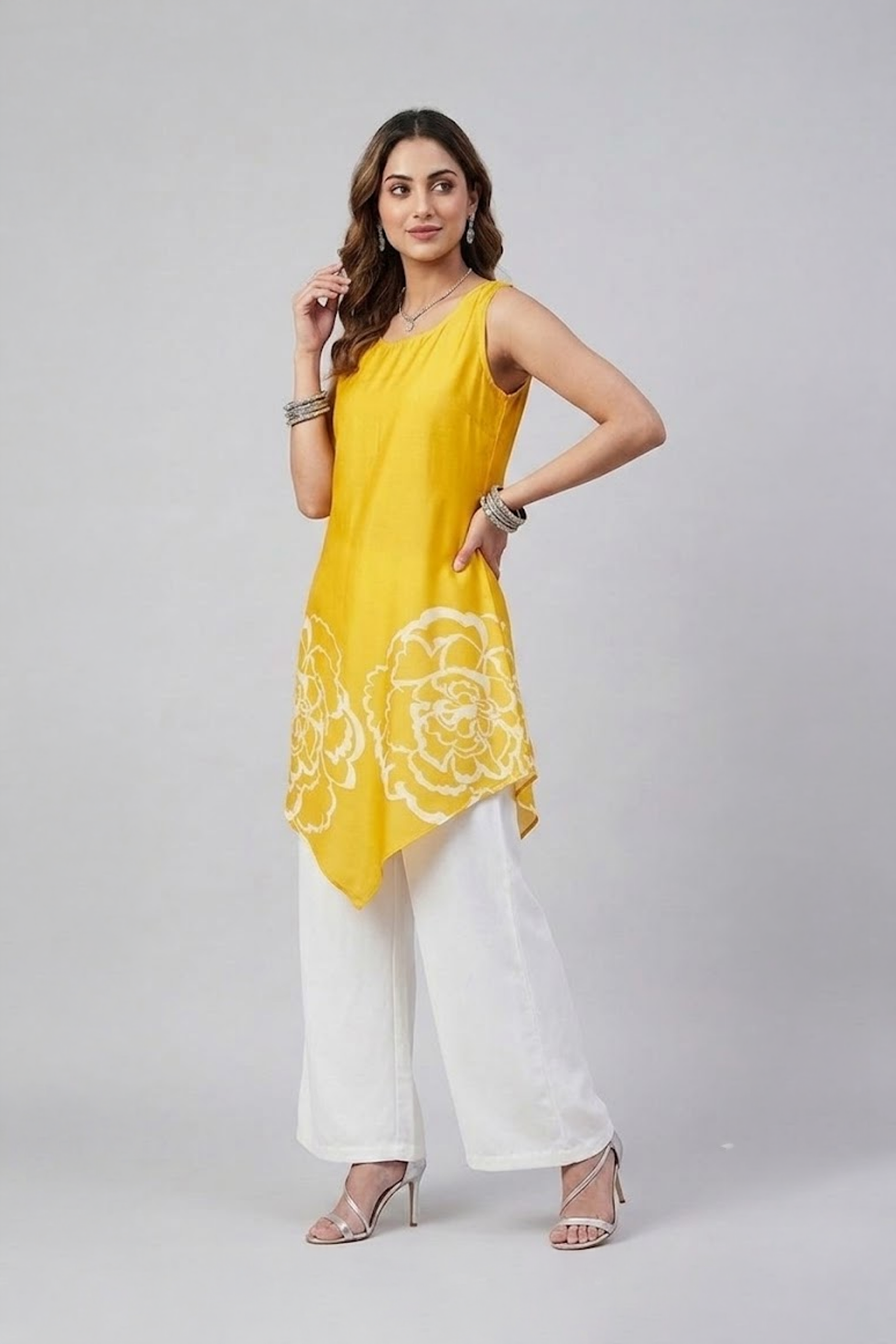 Yellow floral asymmetric tunic set with white wide-leg pants