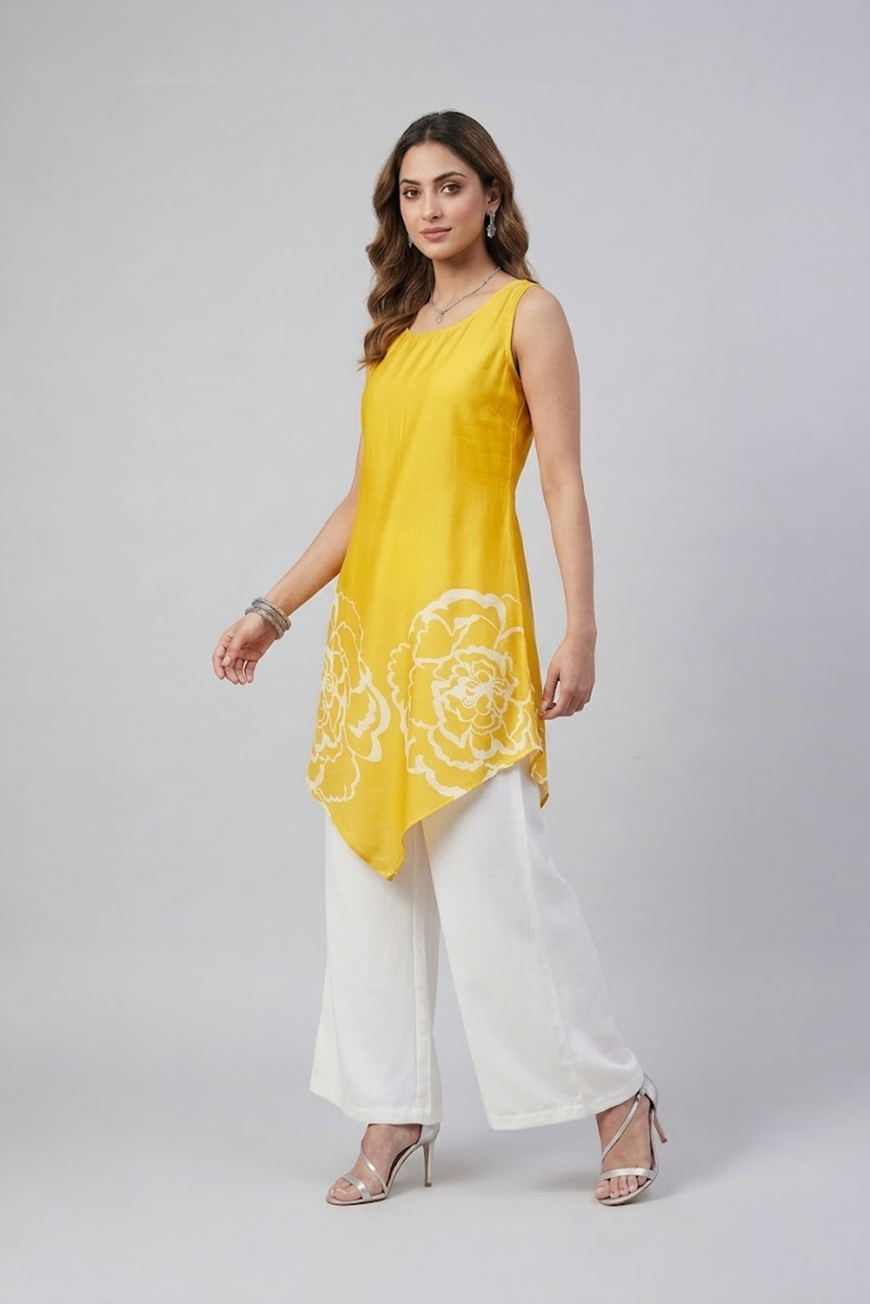 Yellow floral asymmetric tunic set with white wide-leg pants